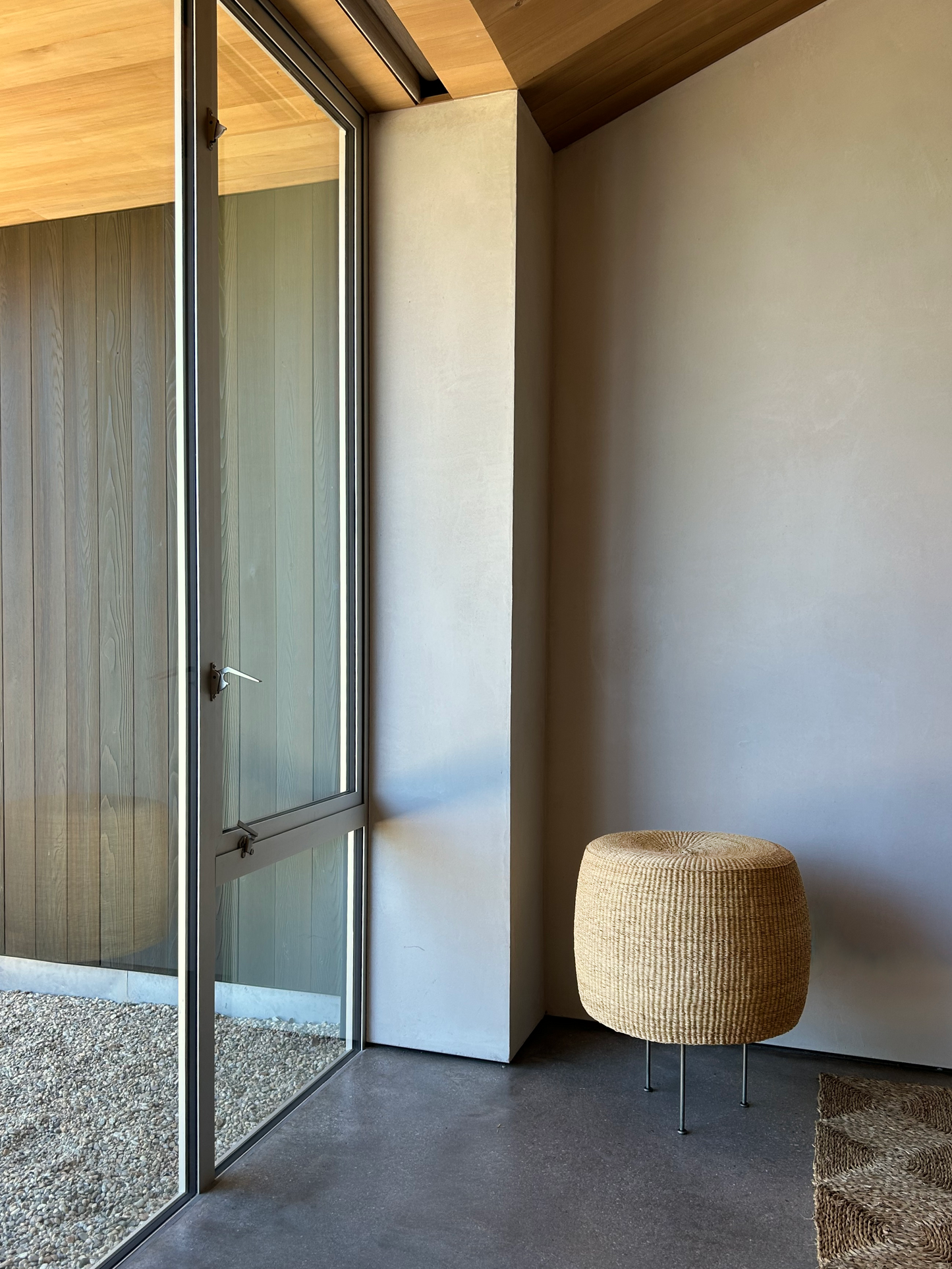 Modern interior with a woven floor lamp