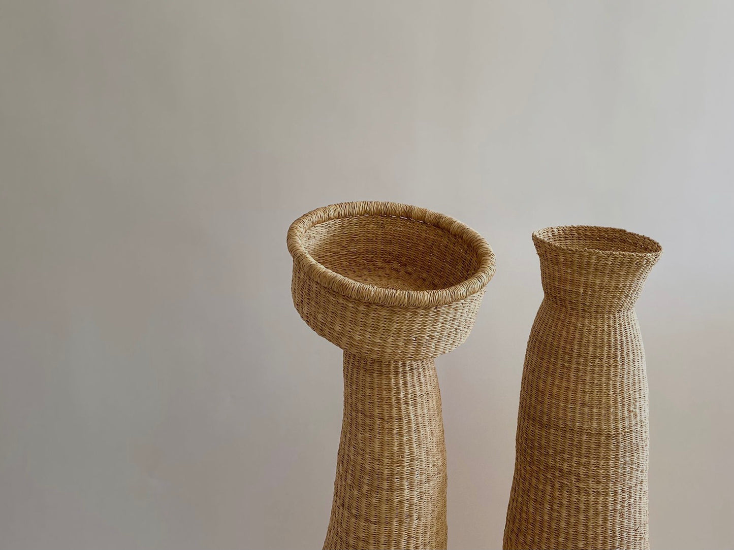 Hand woven sculptures, made from natural African materials.