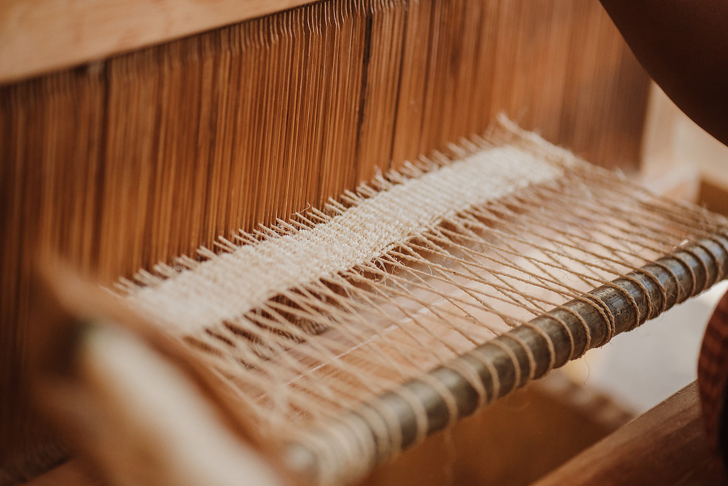 The weaving process using twine made from Mexican maguey agave leaves.