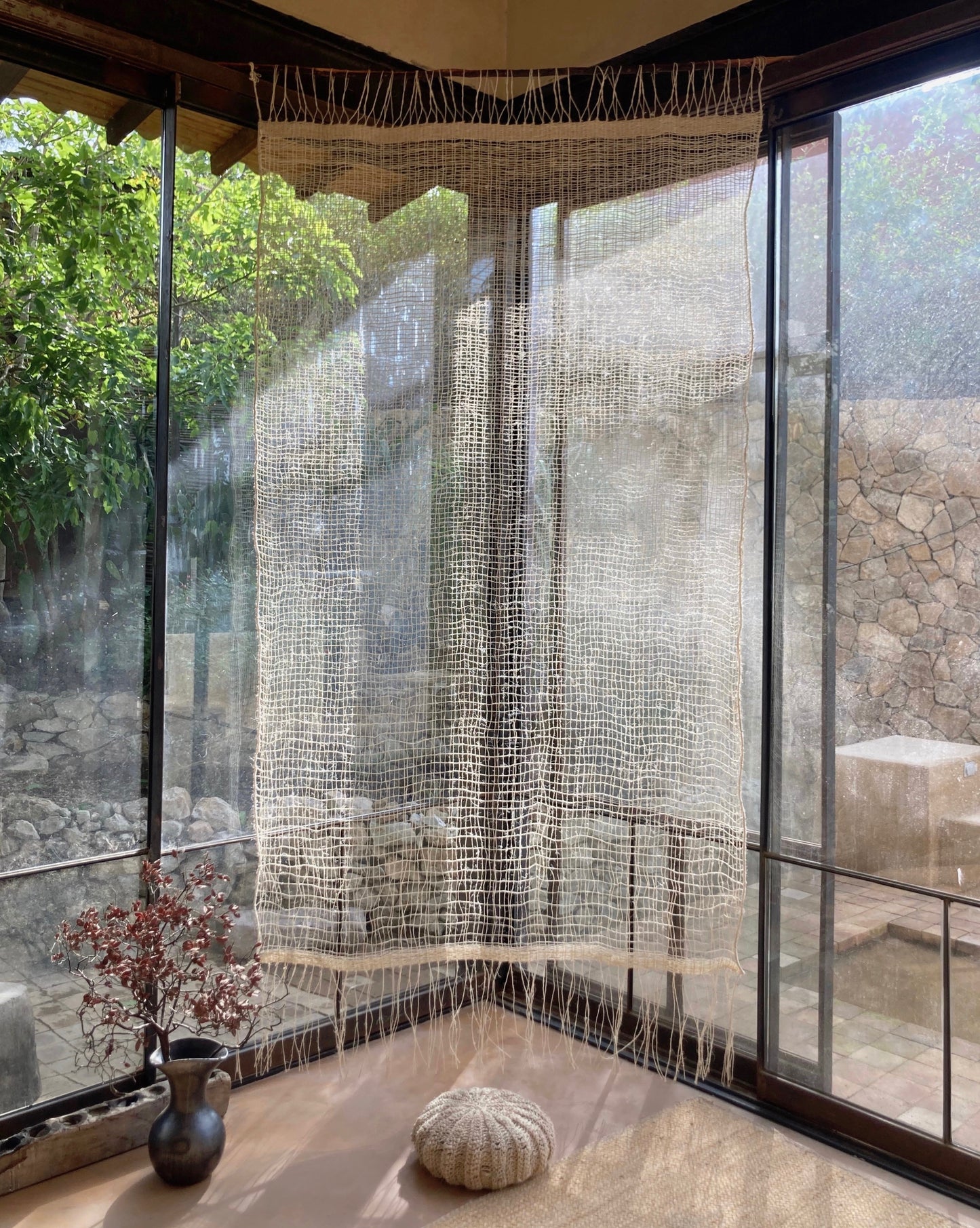 The Cortina Maguey is a handwoven sheer textile hanging, made in Oaxaca, Mexico. These natural colored curtains make beautiful room dividers, window coverings or wall hangings.