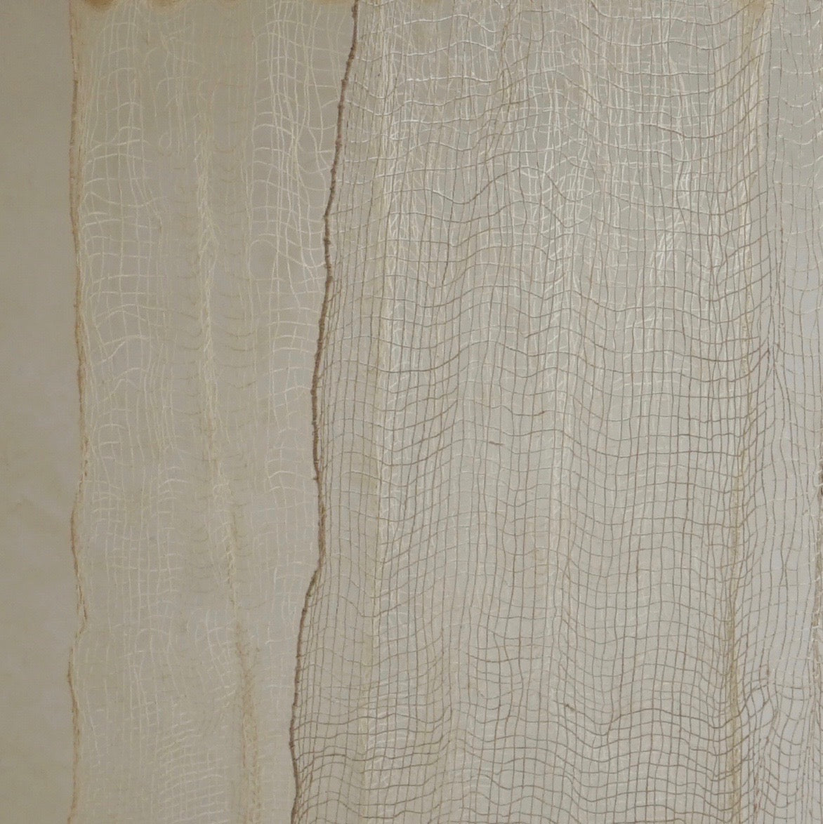 The Cortina Maguey is a handwoven sheer textile hanging, made in Oaxaca, Mexico. These natural colored curtains make beautiful room dividers, window coverings or wall hangings.