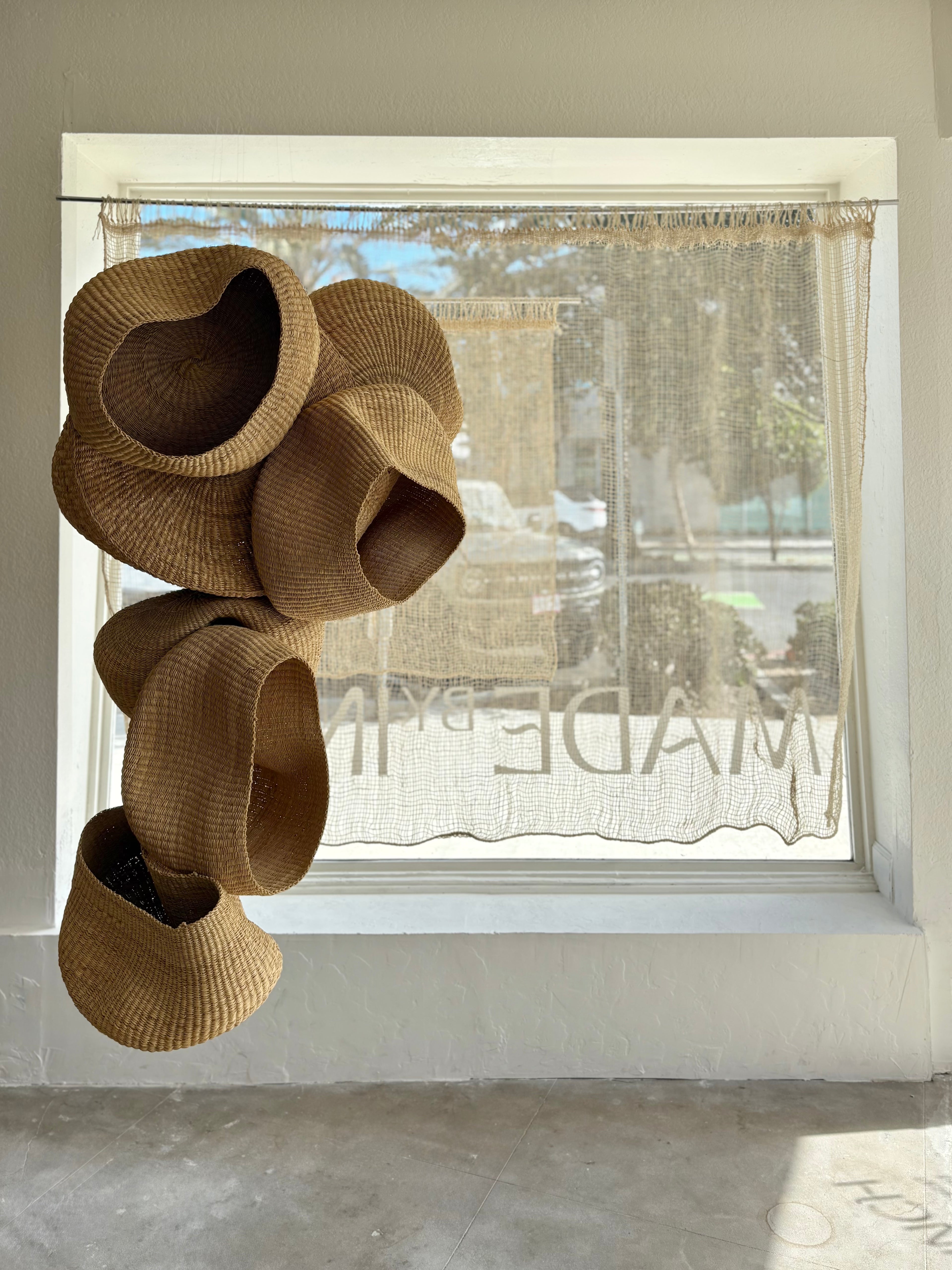 Handwoven sculptural installations made with women weavers in Ghana and Mexico. Organic modern biophilic lighting. Trade program available. Los Angeles.